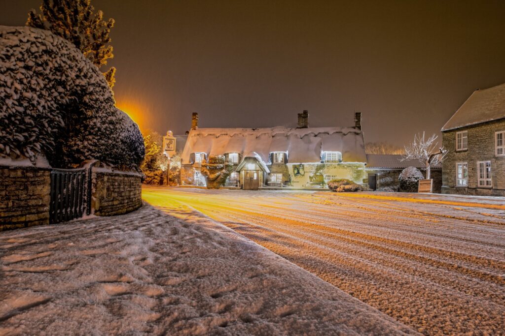 A picturesque snow-covered landscape in New England, representing a classic winter season