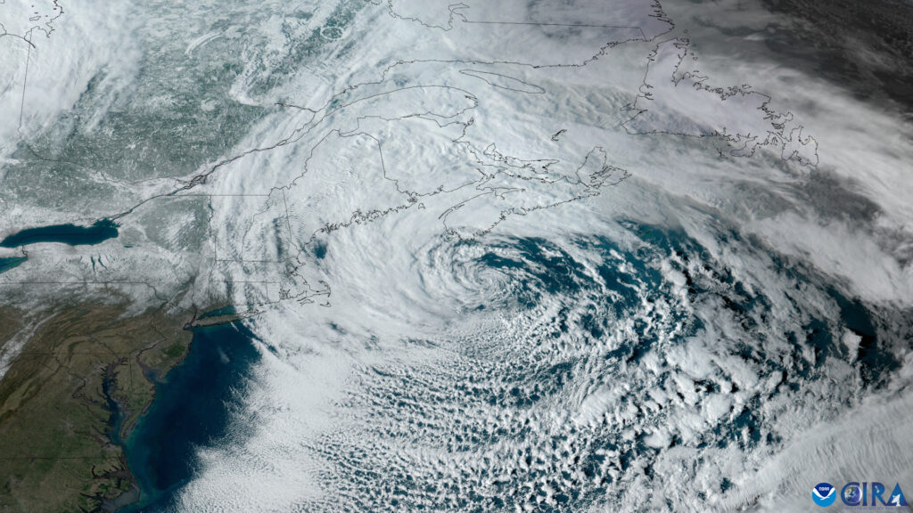 A satellite view of a nor'easter storm system bringing heavy snow and coastal winds to the Northeast